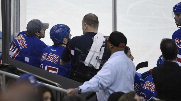 Rangers vs. Capitals 39 New York Rangers goalie Henrik Lundqvist, left, looks on from the bench against the Washington Capitals in the second period of an NHL hockey game at Madison Square Garden on Sunday, March 29, 2015.