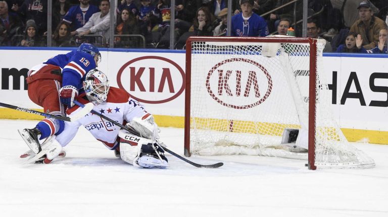 Rangers vs. Capitals 46 New York Rangers right wing Kevin Hayes scores on Washington Capitals goalie Braden Holtby in the first period of an NHL hockey game at Madison Square Garden on Sunday, March 29, 2015.