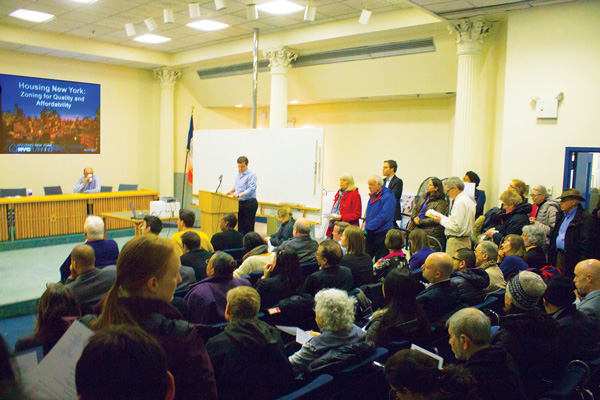 Photo by Zach Williams More than 50 people crowded into a DCP public hearing on March 25, with dozens more viewing the meeting on closed circuit. 