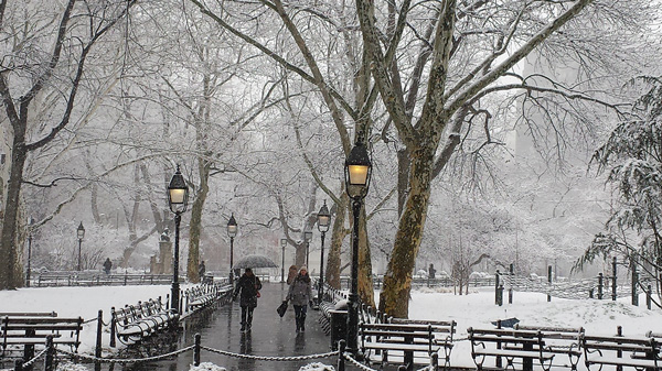 In hopefully winter’s last gasp, wind-whipped wet snow blanketed Washington Square Park on Friday afternoon.   Photo by The Villager