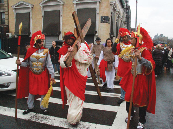 Cross crossing on Easter on E. Houston St. 2 Photos by Clayton Patterson
