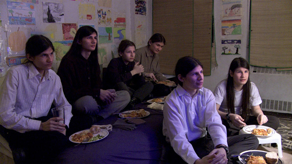 Photo by Crystal Moselle The Angulo brothers eat dinner while watching a movie. L–R, back: Narayna, Govinda, Jagadisa and Bhagavan. Front, from L: Mukunda and Krsna.  