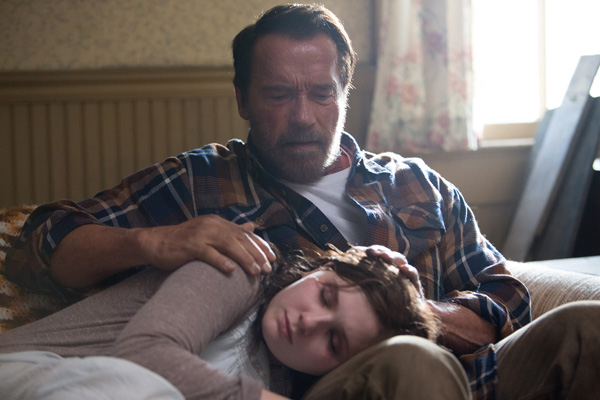 Photo by Lukas Ettlin Arnold Schwarzenegger as Wade and Abigail Breslin as the titular character, in “Maggie.” 