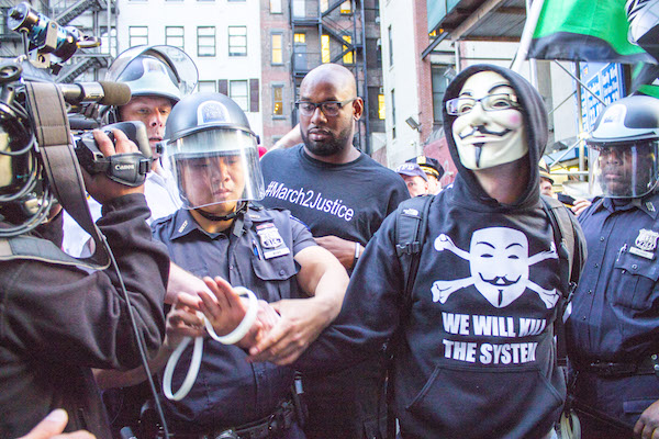 Solidarity for Baltimore Sparks Activist, NYPD Tension 4 Photo by Zach Williams An arrest is made, near Union Square. By the end of the night, roughly 100 people were taken into police custody.