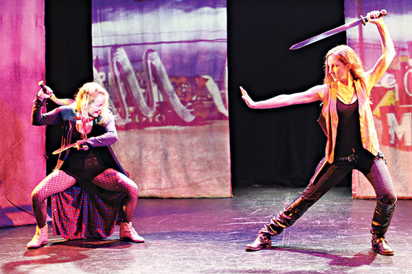 ‘Vengeance' is violent, absurdist fun 1 Photo by Theresa Squire Queen Mad (Nicky Schmidlein) and Jess December (Jamie Dunn) face off in one of the titular rounds of vengeance.