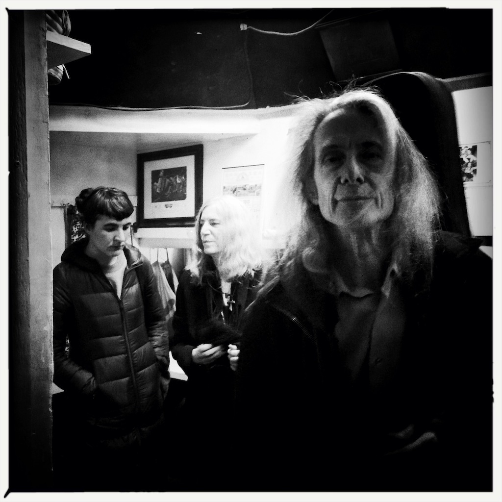 Lenny Kaye, Patti Smith’s guitarist, getting ready to leave after playing at the East Village fire benefit last Sunday night.  Photos by Q. Sakamaki