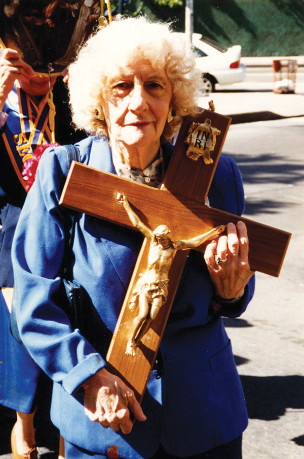 Very religious, Joyce DeChristino carried the cross in Our Lady of Pompeii’s processions, including for the Feast of Our Lady of the Rosary, in October 1995, above.