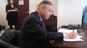 Downtown Express photo by Josh Rogers Assemblymember Sheldon Silver at his School Overcrowding Task Force meeting April 15. Behind him is his chief of staff, Judy Rapfogel.  