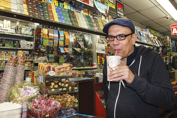 Jaime Vasquez, with an egg cream at Gem Spa, thinks it’s hip to sip in support of the impacted businesses.  Photos by Tequila Minsky