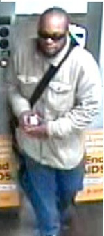 A surveillance-camera image of the suspect in an attempted armed robbery inside 78 Fifth Ave. on April 7. Here he is shown going through the turnstile in the subway at 14th St. and Sixth Ave.