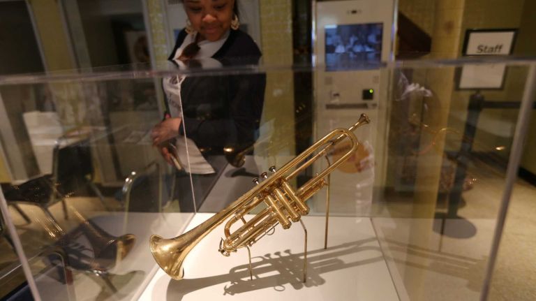 Louis Armstrong House Museum gets bigger home 2 Airica Daley, visiting from Chicago, looks at a Selmer trumpet at the Louis Armstrong House Museum at 34-56 107th street in North Corona, Queens, Tuesday, April 21, 2015.