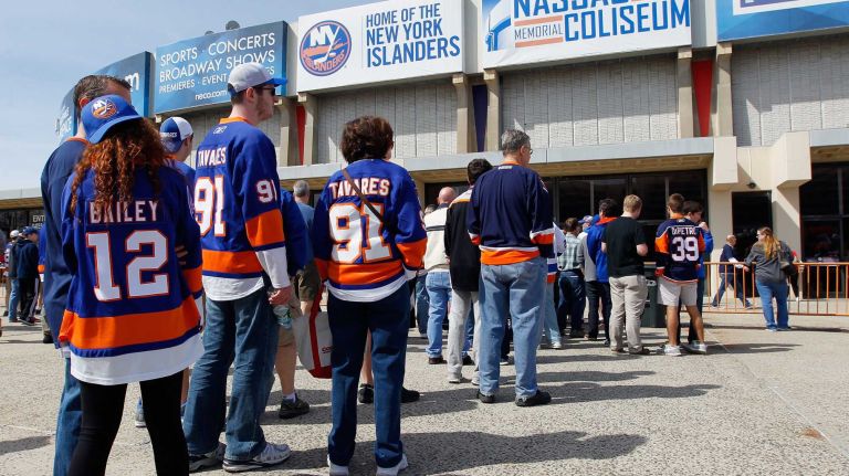 Fans arrive for Game 3 of the Eastern Conference quarterfinals between the New York Islanders and the Washington Capitals during the 2015 NHL Stanley Cup Playoffs at the Nassau Veterans Memorial Coliseum on April 19, 2015.