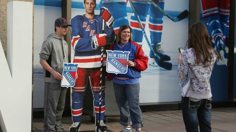 Fans arrive for the festivities before Game 1 of the Eastern Conference quarterfinals between the New York Rangers and the Pittsburgh Penguins in during the 2015 Stanley Cup playoffs at Madison Square Garden on April 16, 2015.