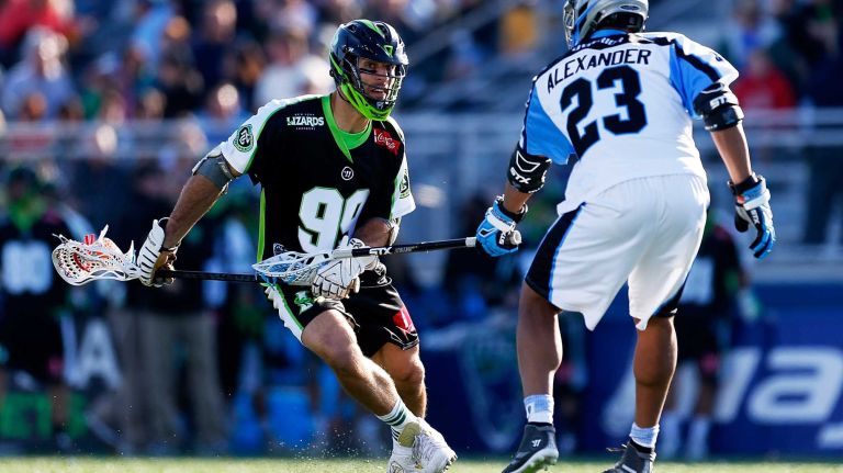 NY Lizards vs. Ohio Machine 31 HEMPSTEAD, NY - APRIL 12: Paul Rabil #99 of the New York Lizards carries the ball against Dominique Alexander #23 of the Ohio Machine at James M. Shuart Stadium on April 12, 2015 in Hempstead, New York. (Photo by Mike Stobe/Getty Images)