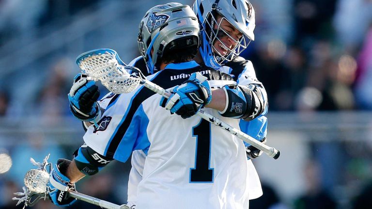NY Lizards vs. Ohio Machine 41 HEMPSTEAD, NY - APRIL 12: Peter Baum #15 of the Ohio Machine celebrates his goal with teammate Marcus Holman #1 against the New York Lizards at James M. Shuart Stadium on April 12, 2015 in Hempstead, New York. (Photo by Mike Stobe/Getty Images)
