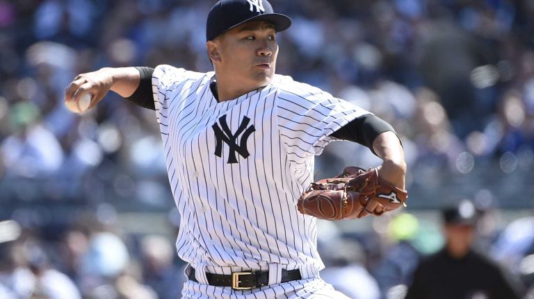Yankees Opening Day in 2015 43 Yankees starting pitcher Masahiro Tanaka throws against the Toronto Blue Jays on Opening Day in the first inning at Yankee Stadium on Monday, April 6, 2015.