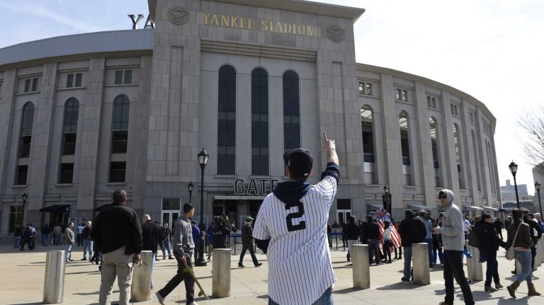 Yankees Opening Day in 2015 58 A Yankees fan wears a Derek Jeter jersey outside Yankee Stadium on Opening Day before a baseball game between the New York Yankees and the Toronto Blue Jays on Monday, April 6, 2015.