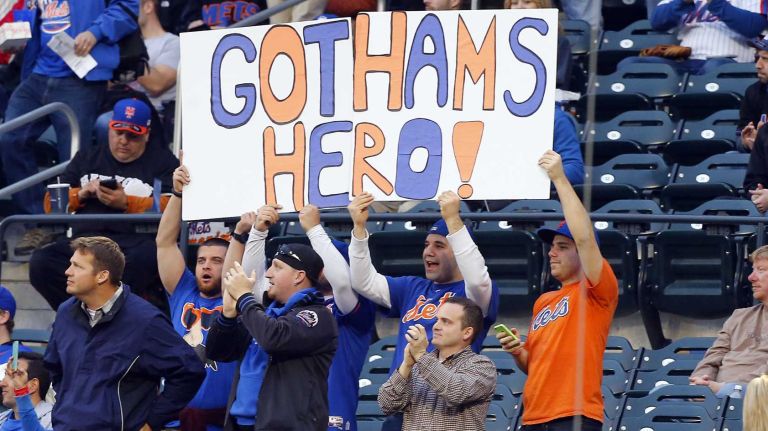 New York Mets fans hold a Matt Harvey banner before a game against the Philadelphia Phillies at Citi Field on Tuesday, April 14, 2015.