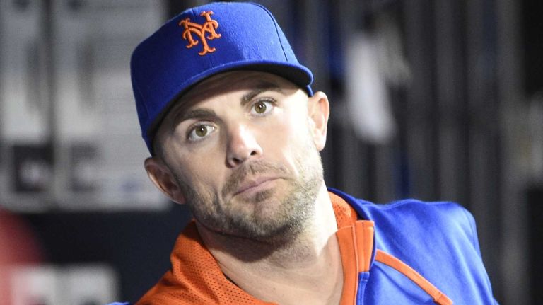 Mets third baseman David Wright looks on from the dugout against the Miami Marlins in a baseball game at Citi Field on Thursday, April 16, 2015.