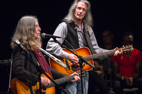 Patti Smith and guitarist Lenny Kaye rocked the East Village fire benefit at Theatre 80 St. Mark’s Sunday night.   Photo by Ronald Andrew Schvarztman