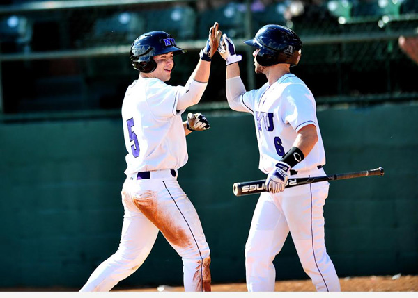 Adrian Spitz, left, and C.J. Picerni celebrated after scoring a run.