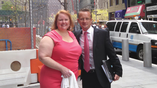 Stephanie Adams and Yves Guelat, who walked the new sidewalk immediately after it opened. 