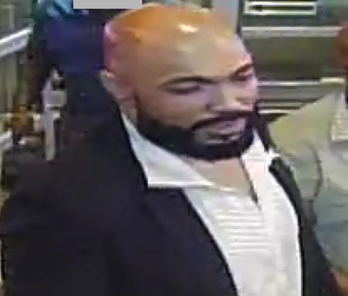 A photo released by police of a suspect, identified as Bayna El-Amin, 41, wanted in connection with the recent assault on two gay men at the Dallas BBQ in Chelsea.