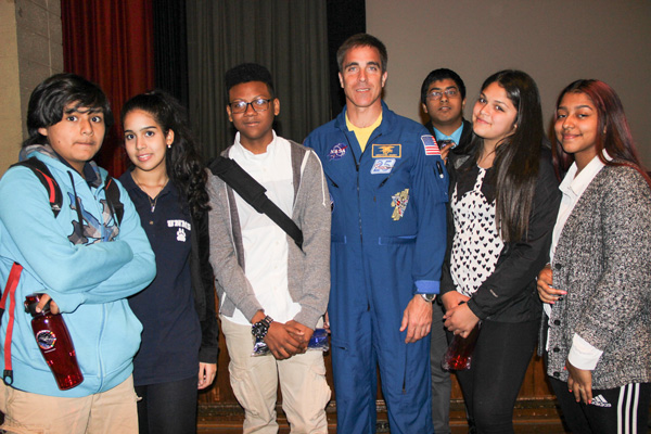 Captain Cassidy pulled some middle-school students into his orbit after his presentation.