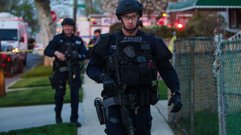 Police from Nassau County raced to Queens to aid NYPD officers in the search before the suspect was caught.