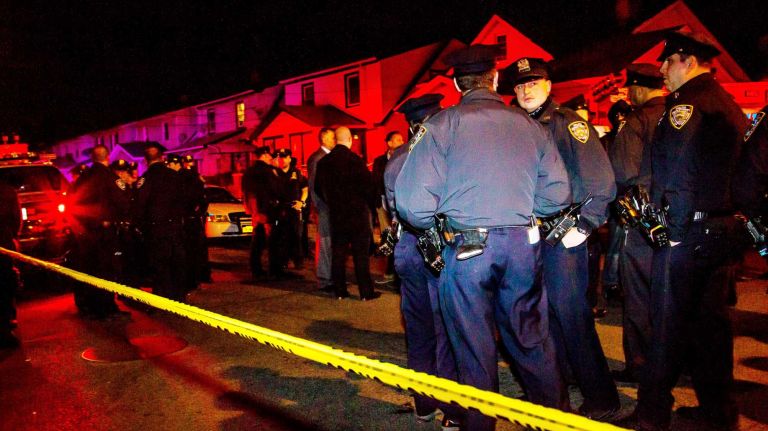 An NYPD officer was shot and wounded in Queens Village on Saturday evening, May 2, 2015, setting off an intense search for the suspect. 