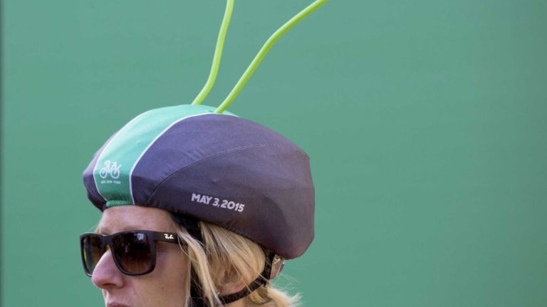A participant wears a decorated helmet as the Five Boro Bike Tour starts in Soho Sunday, May 3, 2015.