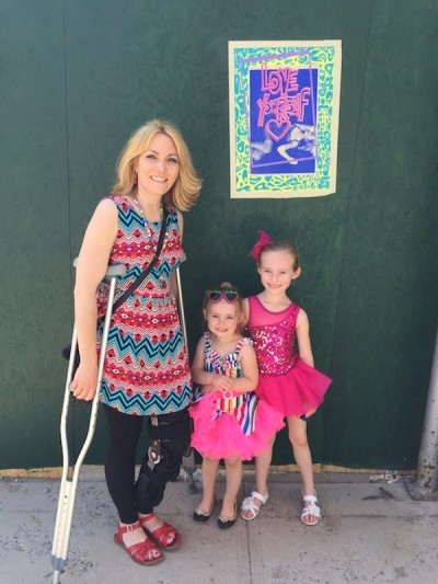 Heather Hensl with her daughters on Mother's Day. a month after a hit and run driver rammed into her on Beekman St.