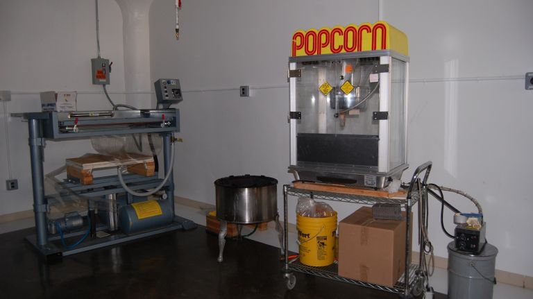 Machines that make delicious treats are everywhere at the Jacques Torres Chocolates factory.