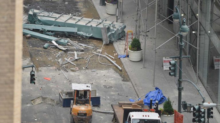 Multiple injuries reported after AC unit falls from crane in Midtown 2 An air conditioning unit being moved to the top of a building on Madison Avenue in midtown Manhattan fell to the street May 31, 2015, the NYPD said.