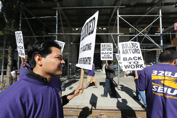 Printing House workers picketed on Wednesday and rallied for fired doorman Arturo Vergara.