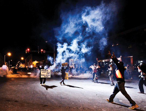 On Mon., April 26, protesters faced off with police after the 10 p.m. curfew during the second day of riots following Gray’s funeral.