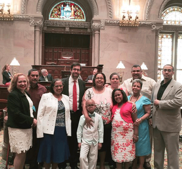 State Senator Daniel Squadron, second from left, with Aixa Torres, far left, and family at the State Senate on May 5.