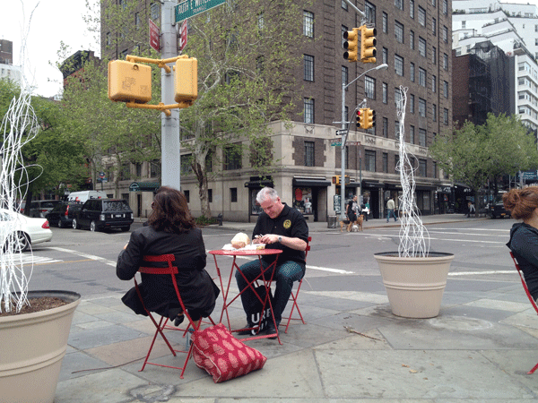At the intersection of sitting, noshing, info, art 1 People can now munch a lunch, sit and relax or chat with a friend on Ruth Wittgenstein Triangle. At right and left are two parts of John Schriner’s “In Flux” art installation.