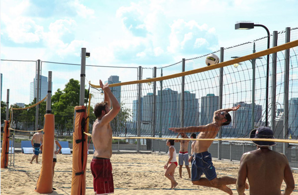 Fun and funding mix at Hudson River Park Games 1 Hudson River Park Games athletes train to compete in beach volleyball on Pier 25.