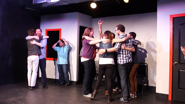 Have You Heard the One About the Depressed Comedians? 2 A group hug at the end of April’s show. Photo by Maya Dangerfield.