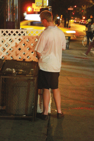 While all the police were dealing with the noise and commotion down the block, this guy was urinating in plain view on Stanton St. between Ludlow and Essex Sts.    Photos by Clayton Patterson