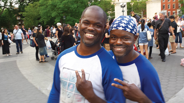 Buskers Tic, right, and Tac have been performing since they were 12.   Photos by Lincoln Anderson