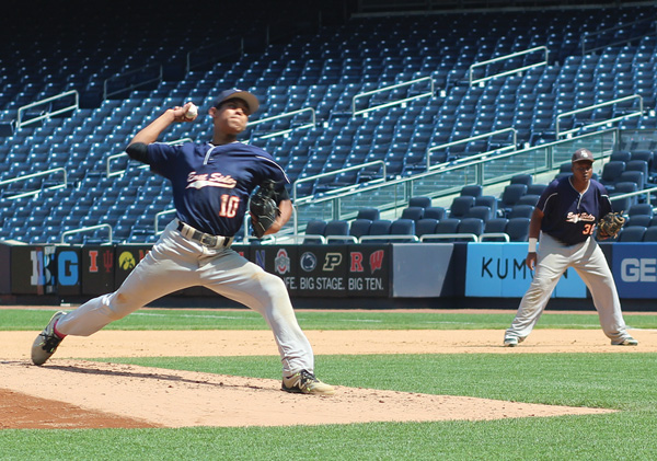 Pitcher Timothy Lopez delivered to the plate on his way to a complete-game, seven-inning shutout as East Side won the title.   Photos by kerisa jones