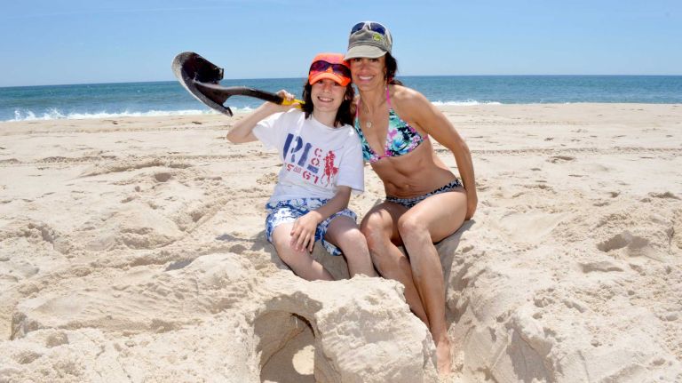 Justin and Dana Gurvitch hang out at Flying Point Beach in Water Mill on Sunday, June 7, 2015.
