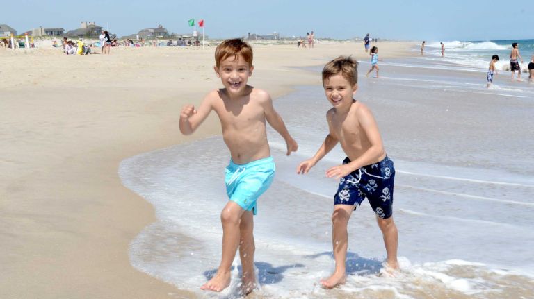 Christian and Declan Paterek hang out at Rogers Beach in Westhampton Beach on Sunday, June 7, 2015.