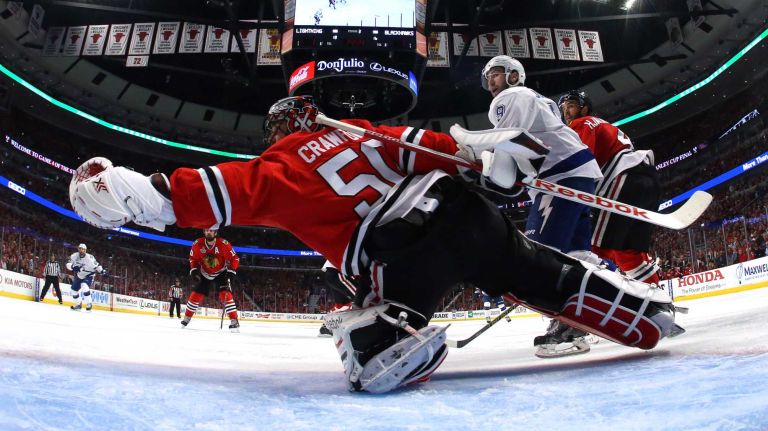Stanley Cup Final: Blackhawks vs. Lightning 48 CHICAGO, IL - JUNE 10: Corey Crawford #50 of the Chicago Blackhawks makes a save against the Tampa Bay Lightning during Game Four of the 2015 NHL Stanley Cup Final at the United Center on June 10, 2015 in Chicago, Illinois. (Photo by Bruce Bennett/Getty Images)