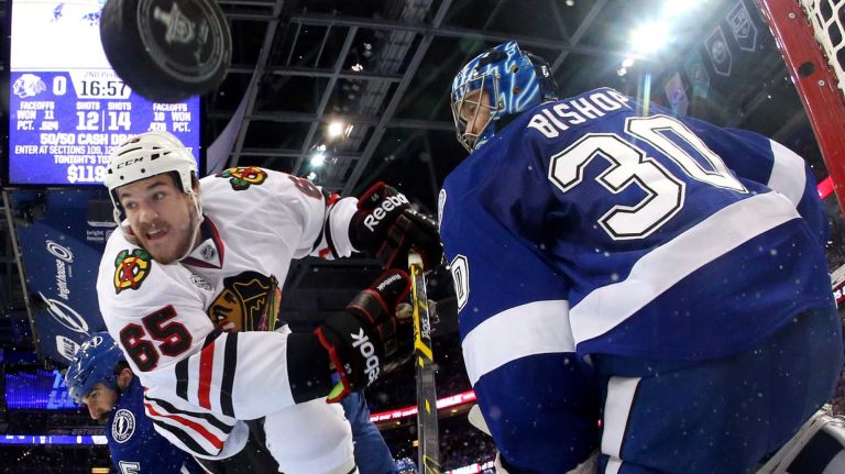TAMPA, FL - JUNE 06: Andrew Shaw #65 of the Chicago Blackhawks scores a goal against Ben Bishop #30 of the Tampa Bay Lightning during the second period in Game Two of the 2015 NHL Stanley Cup Final at Amalie Arena on June 6, 2015 in Tampa, Florida. (Photo by Bruce Bennett/Getty Images)