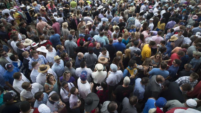 Horse racing fans gather for the 147th running of the Belmont Stakes in Elmont, Saturday June 6, 2015.
