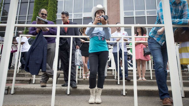 Horse racing fans at Belmont for the 147th running of the Belmont Stakes Saturday, June 6, 2015.