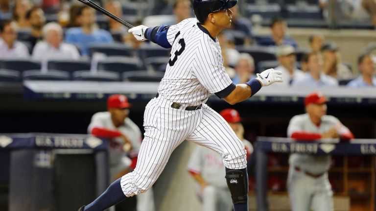 Yankees vs. Phillies 45 Alex Rodriguez #13 of the New York Yankees follows through on a first-inning sacrifice fly against the Philadelphia Phillies at Yankee Stadium on Tuesday, June 23, 2015.
